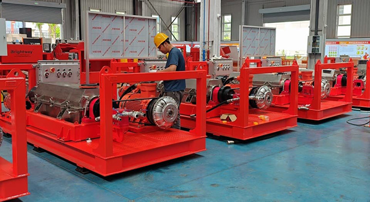 Four drilling fluid centrifuges serve to separate liquid phase from oil-based mud